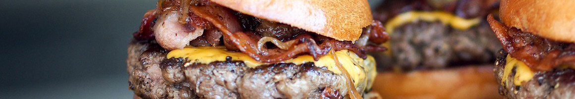 Eating Burger at Craft Burger restaurant in Houston, TX.